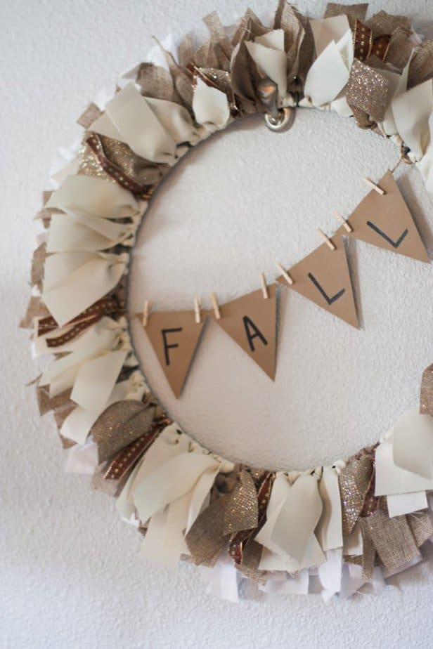 Neutral DIY Fall Ribbon Wreath. This is the best DIY Fal decorating ideas for the porch. Outdoor Fall Decorating ideas for your porch and beyond. Easy fall decorating ideas for your front porch. Lots of simple and inexpensive ideas to help you decorate your home for fall. #falldecor #falldecorations #fallonabudget #homedecorideas